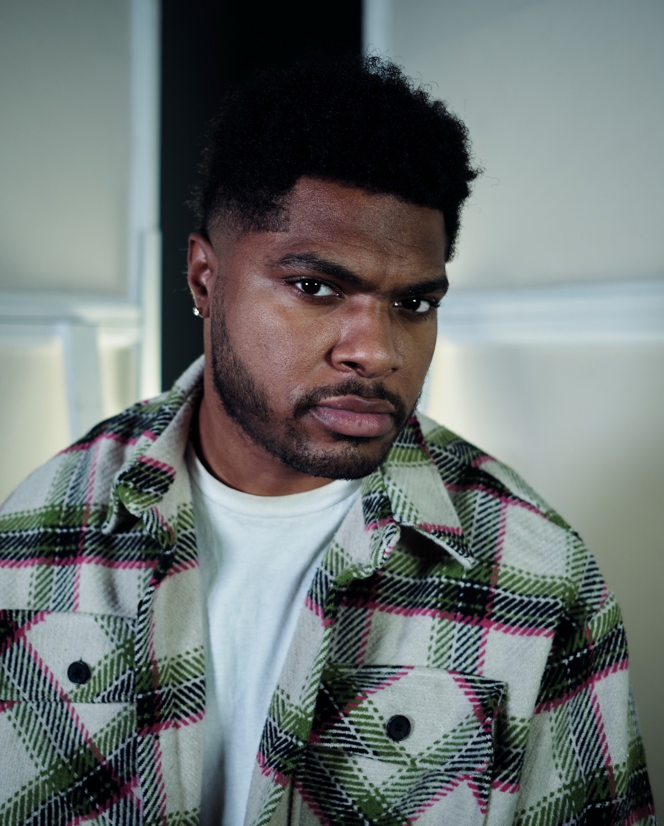 Monk Edwards posing indoors