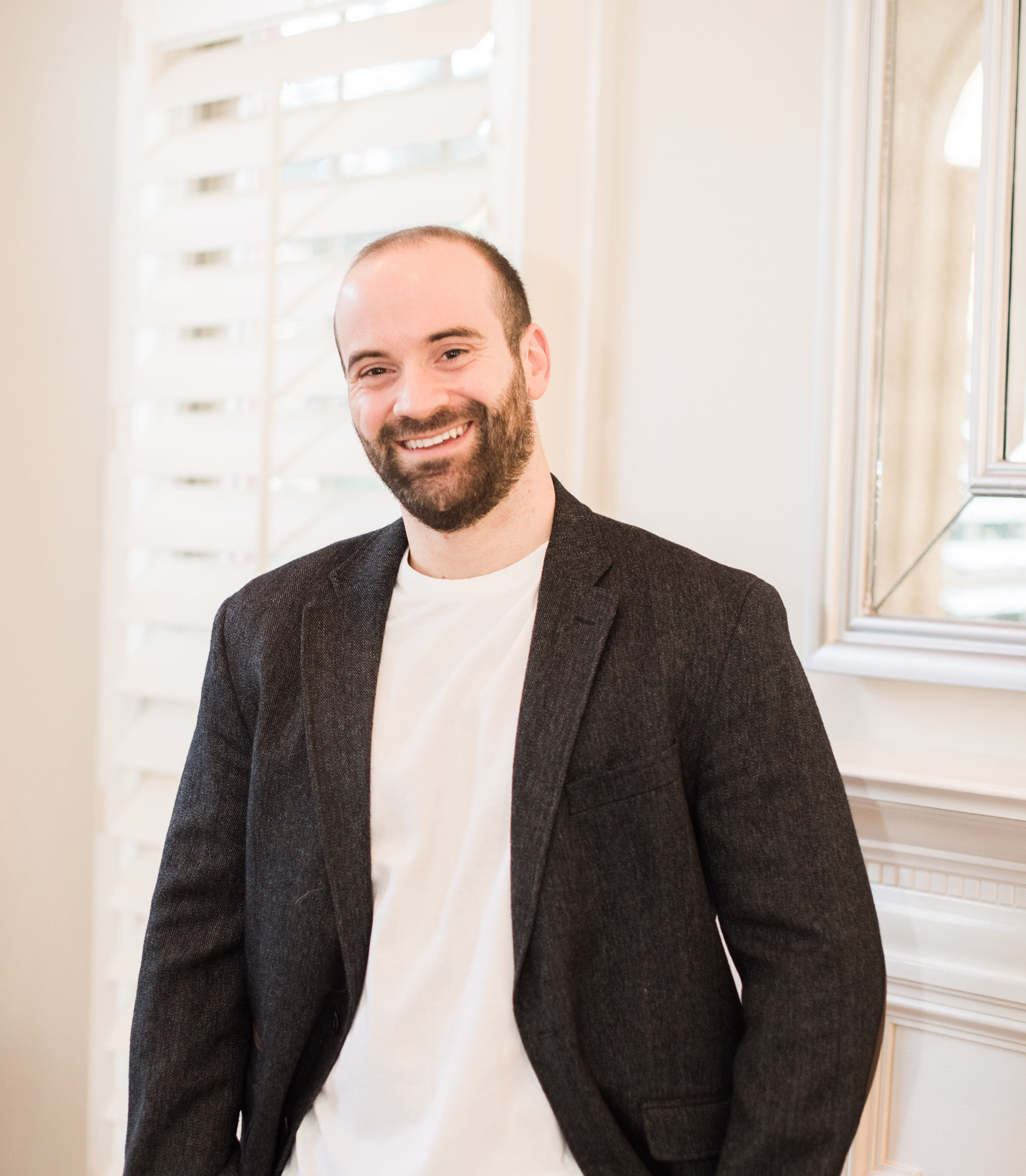 Picture of Sam Marzouk standing and smiling
